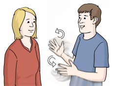 Zwei Menschen sprechen in Gebärdensprache miteinander